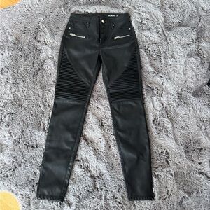 Black leather skinny jeans